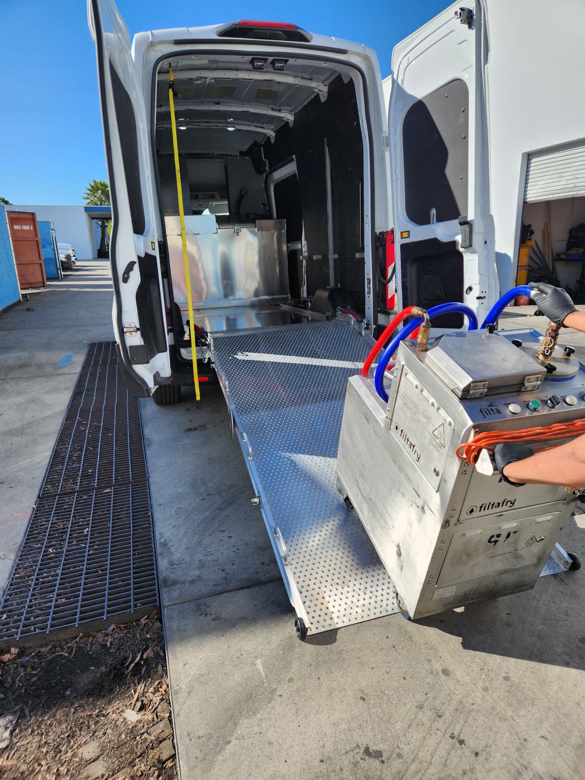 Fleet van with ramp loading service equipment